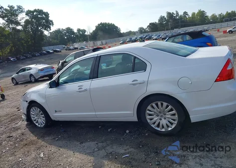 2012 Ford Fusion Hybrid z USA, uszkodzony, nr VIN 3FADP0L32CR371710